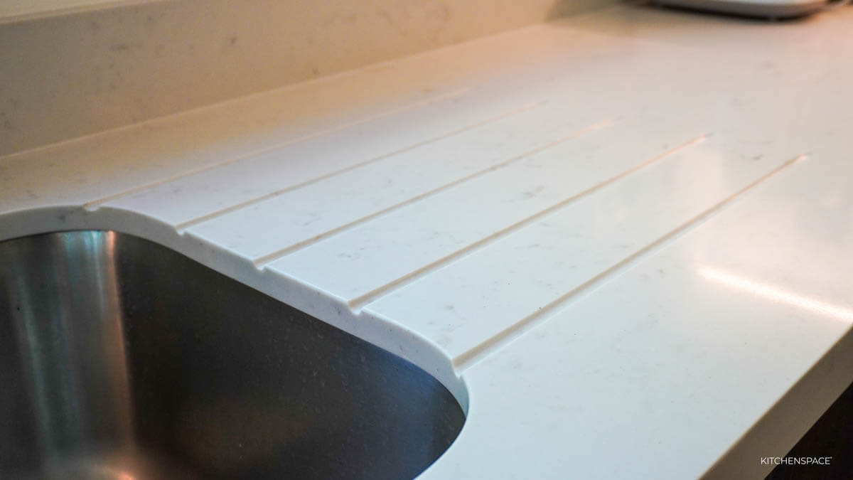 Walnut Kitchen with Geometric Backsplash